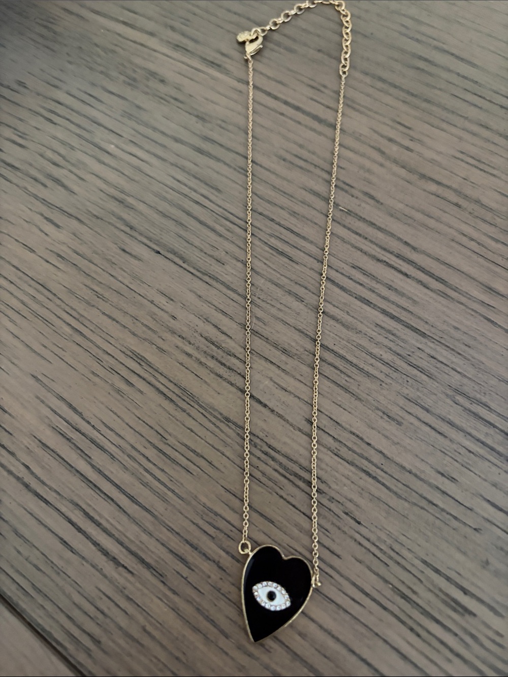 Gold-Tone Necklace with Black Heart Evil Eye Pendant